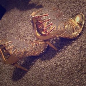 Gold strapped high heels